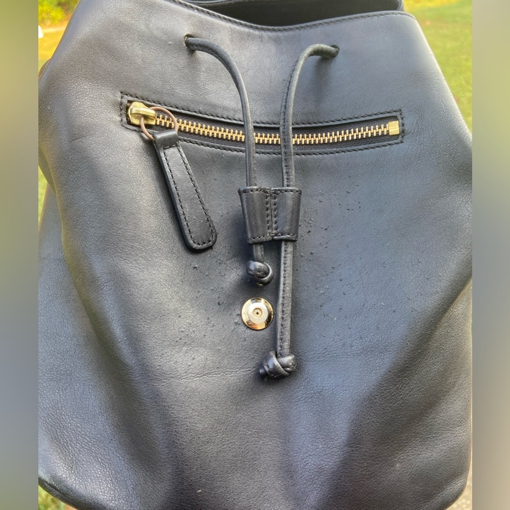 leather Coach backpack 11” x 11”.  VIEW PICS CLOSELY, SCRATCHES ON FRONT FLAP - Picture 5 of 9